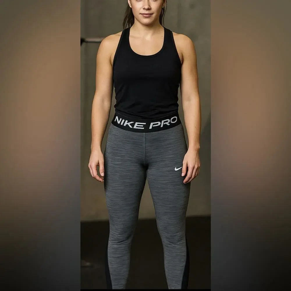 Woman’s Nike Pro Heather Gray with black mesh Leggings Size Small